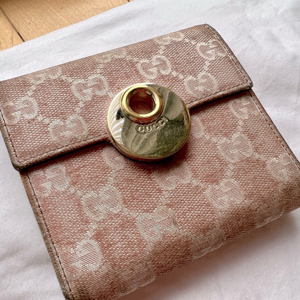 Gucci pink monogrammed wallet